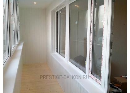 Теплое остекление балкона профилем rehau с утеплением и деревянной отделкой в Одинцово