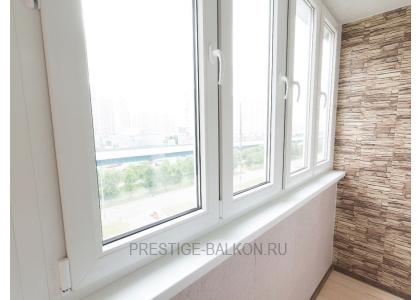 Тёплое остекление балкона профилем КВЕ и комбинированной отделкой пластиком и деревом в Одинцово