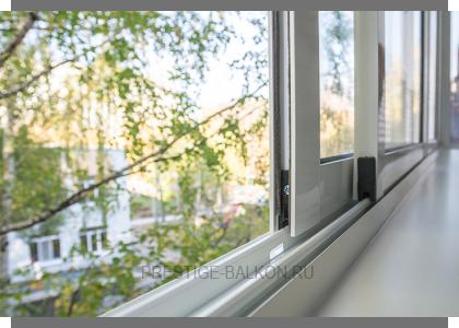 Раздвижное холодное остекление балкона с шумопонижающими отливами в Одинцово